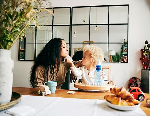 Mom and her child in the living room